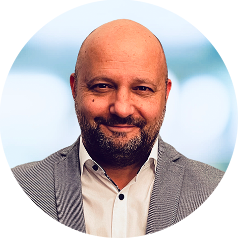 Ansprechpartner bei HARTMANN TRESORE für SIGNATURE SAFES, Porträt eines Mannes mit Bart im grauen Sakko